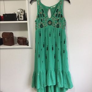 High-low greenish, embellished dress 💚